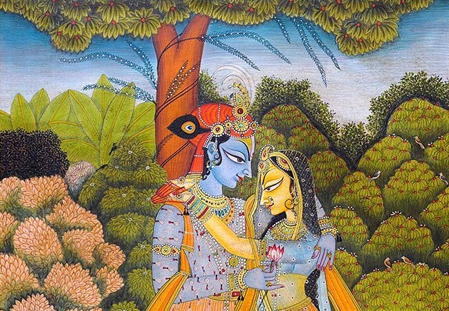 A room with Indian heritage art on the wall